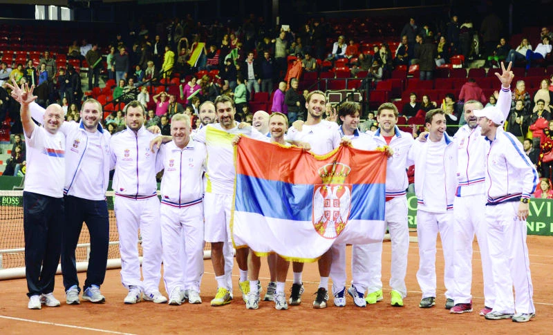 France, Serbia cruise into Davis quarters