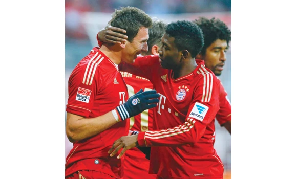 Bayern extends lead to 14 points with win at Mainz