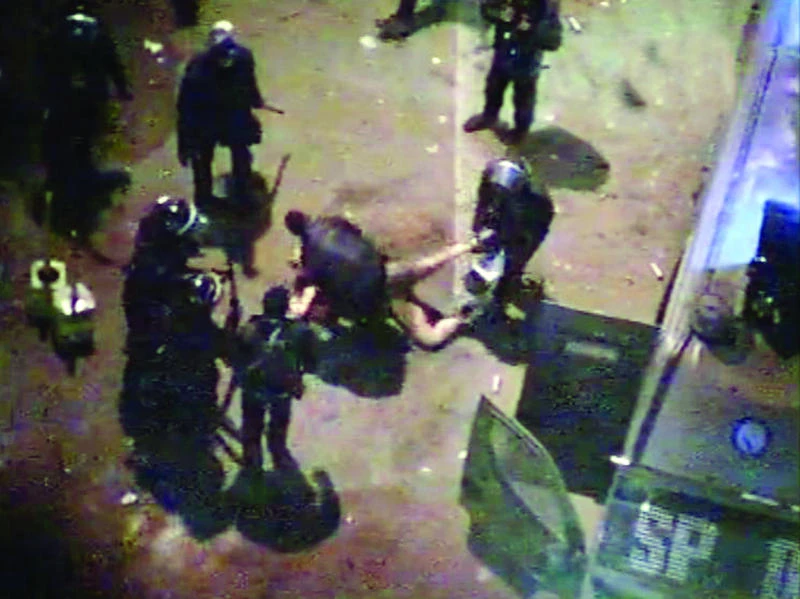 Video of protester stripped and beaten fires Egypt fury