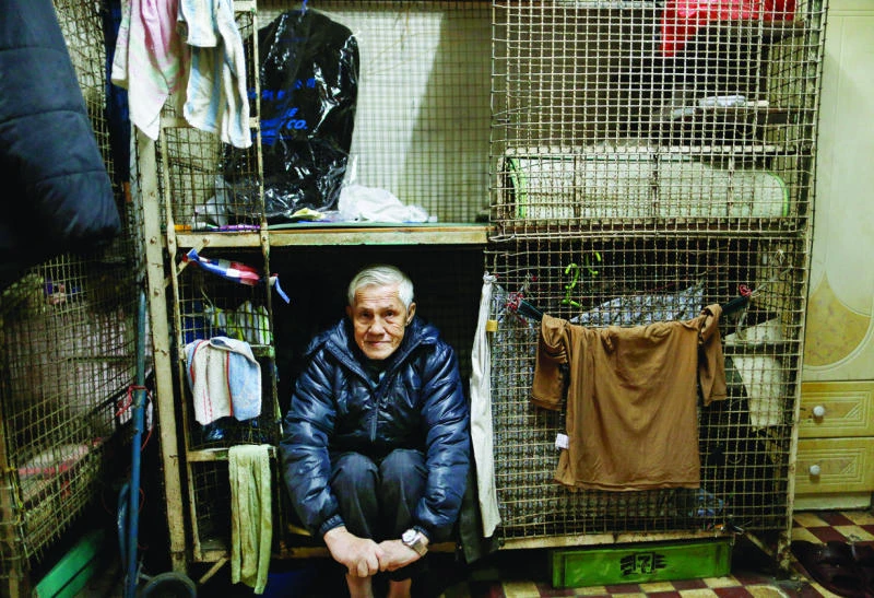 Poor in cages show dark side of Hong Kong boom