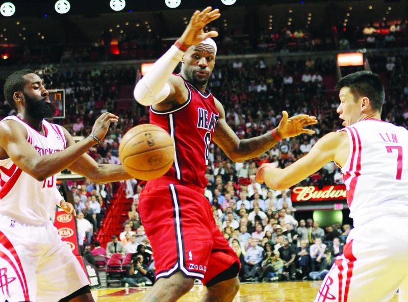 James, Wade combine for 63 as Miami Heat down Houston