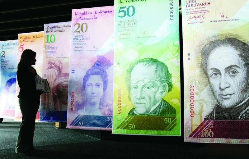 Venezuela devalues currency 32% to trim budget deficit