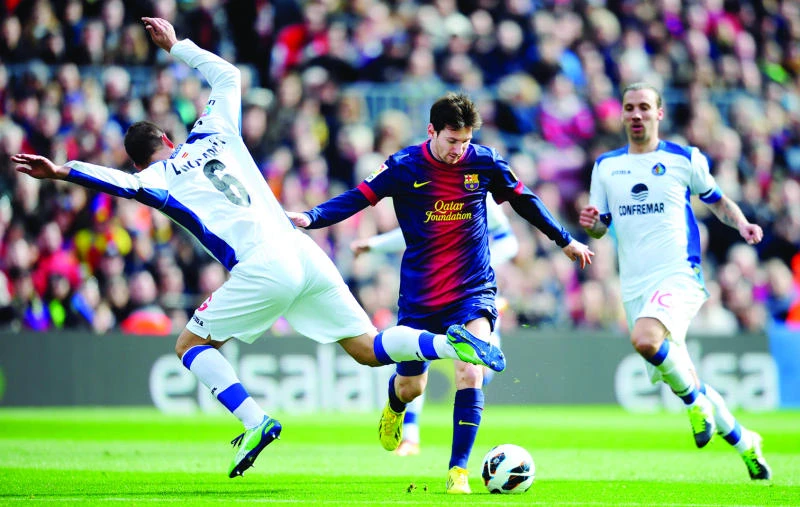 Messi strikes again as Barca crushes Getafe