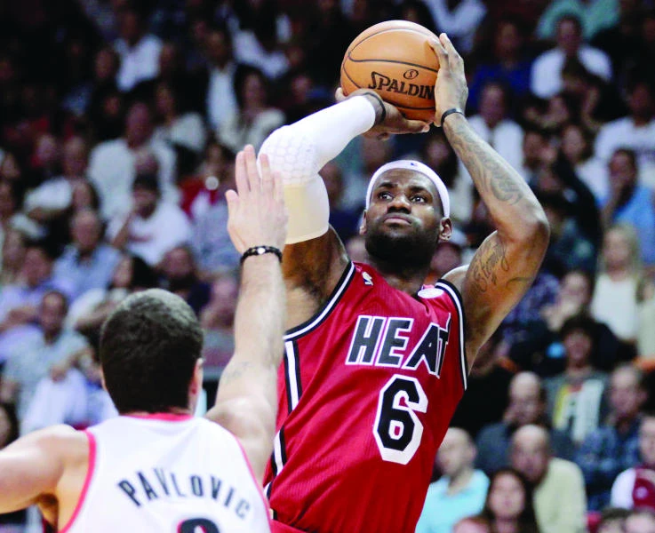 James sets mark, Heat beat Blazers