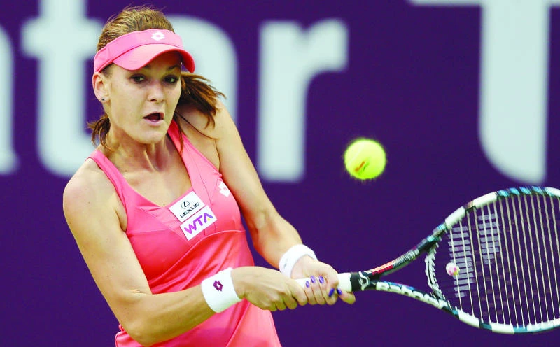 Radwanska gets past Ivanovic to enter quarters