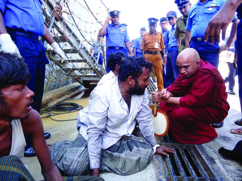 Myanmar survivors say floated at sea for 25 days; 97 dead