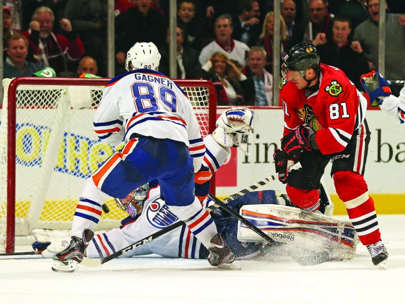 Hossa scores in OT as Blackhawks run streak to 19 games
