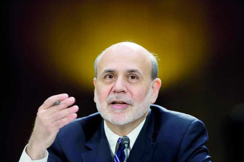 Bernanke warns steep budget cuts could slow growth