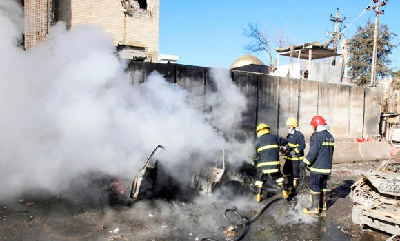 Car bombs kill 36 in Iraq; Sunnis stage protests