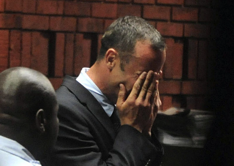 Sobbing Pistorius charged with girlfriend’s murder
