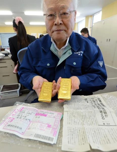 Gold gifts mystify Japanese city devasted by tsunami