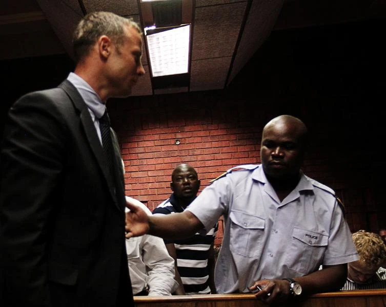 Sobbing Pistorius charged with murder