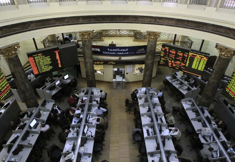 Egypt sells fewer dollars at auction, pound inches up