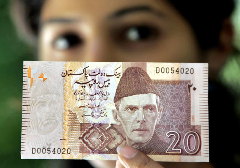 Pakistani rupee sinks to record low against dollar