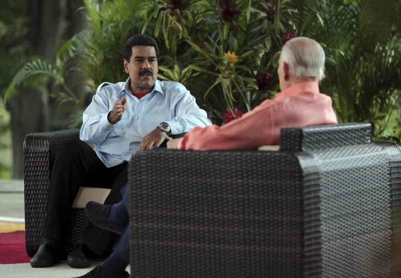 Venezuela’s Maduro urges Obama to halt “plot” against rival