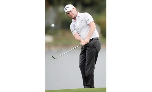 Bold shot gives Villegas lead at Honda Classic