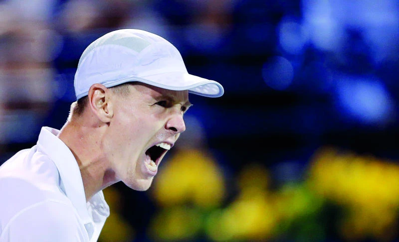 Berdych stuns Federer, to meet Djokovic in final