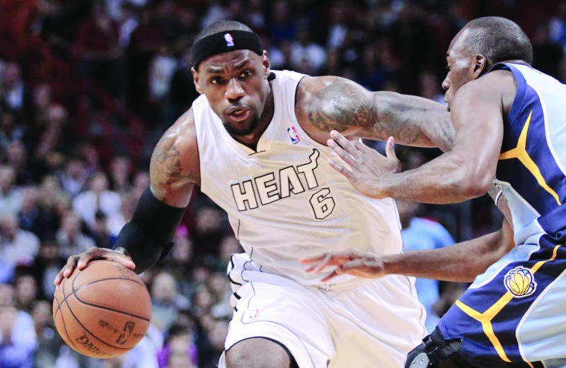 Heat on a roll, beat Grizzlies for No. 13