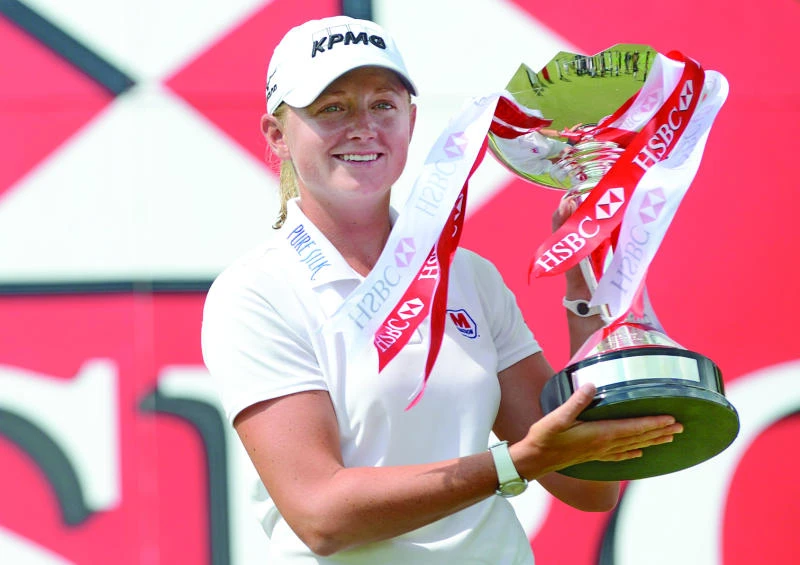 Shot of a lifetime lifts Lewis to HSBC Champions win