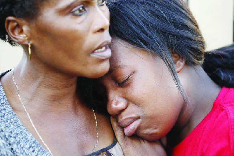Police dragging victim buried in Mozambique