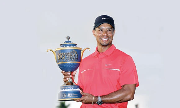 Fired-up Woods wraps up WGC title at Doral