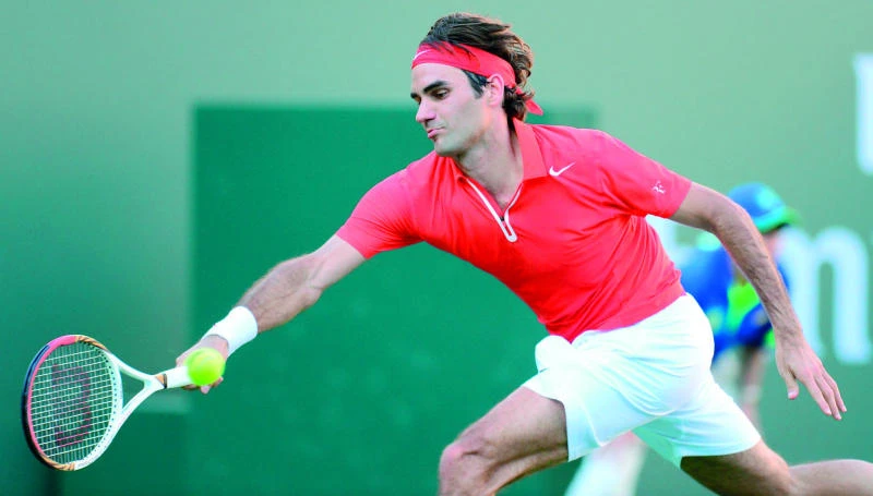 Federer cruises into fourth round