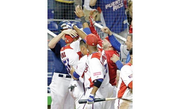 Puerto Rico rallies past Italy in WBC
