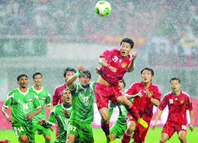 Late-goal drama as China stuns Iraq to give Camacho lifeline