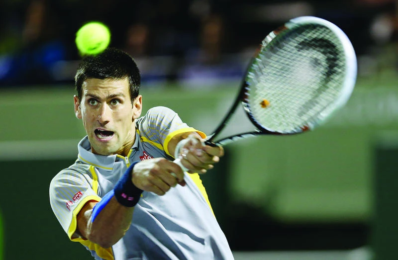 Djokovic, Sharapova cruise to victories