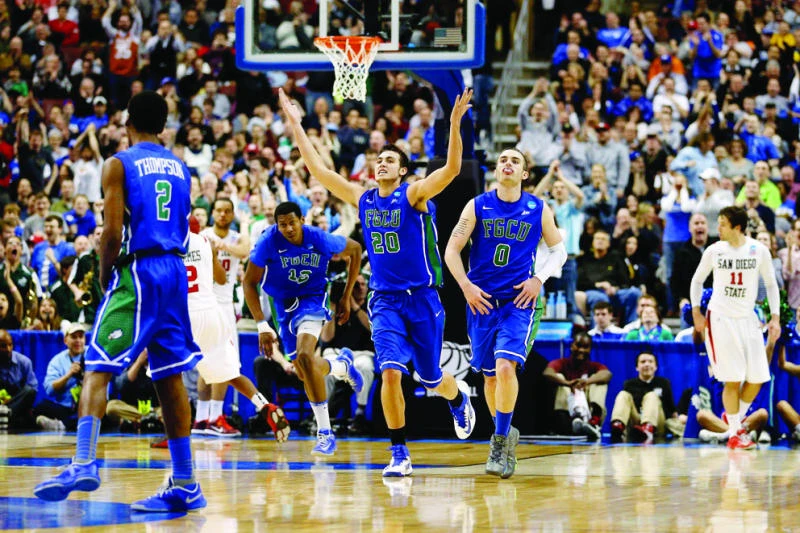 Dunk City living hoop dream in March Madness