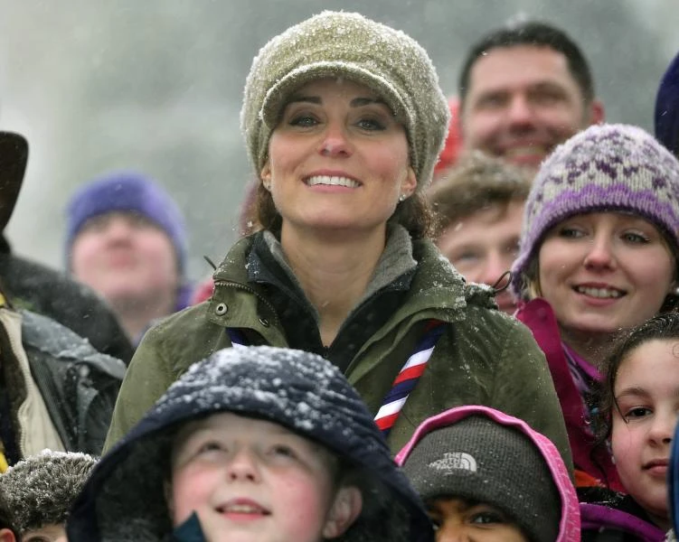 Catherine visits scout group, cooks over campfire