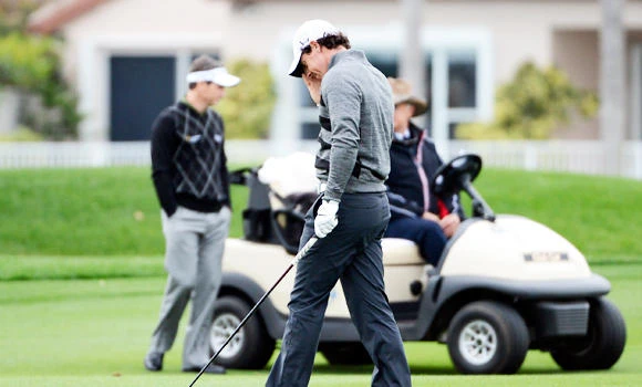 McIlroy walks off course after dropping seven shots