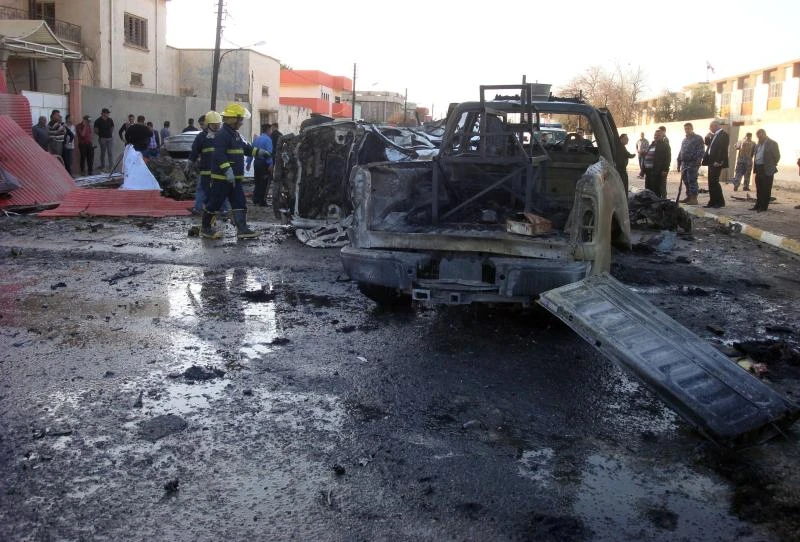 Iraq suicide bomber kills three, wounds 100
