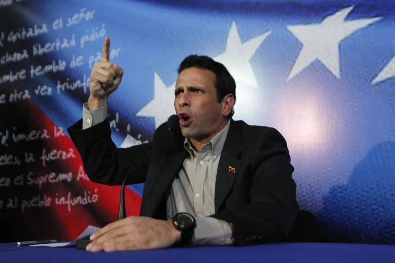 Rivals trade barbs as election to succeed Chavez starts