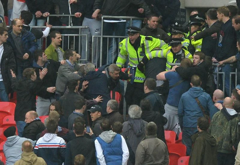 2 charged after crowd violence at FA Cup semi