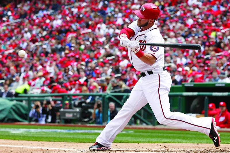 Harper, Strasburg star as Nationals win opener vs. Marlins
