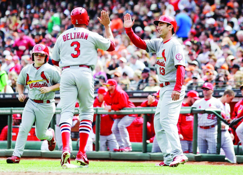 Cardinals use nine-run fourth inning to crush Giants