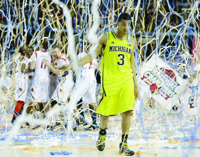 Louisville beats Michigan for 2013 NCAA title