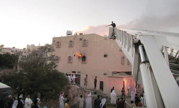 Family saved from burning building