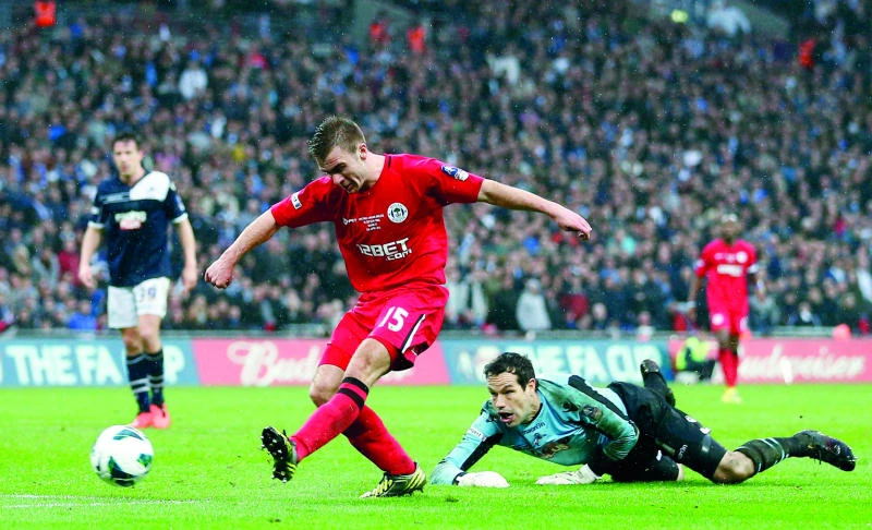 Wigan overcomes Millwall to reach first FA Cup final