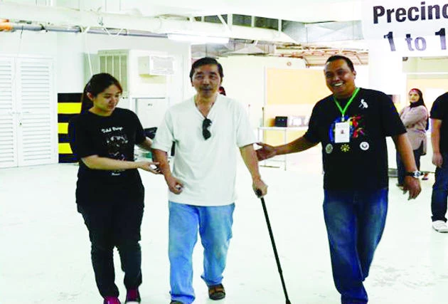 Ailing OFWs among first to cast votes