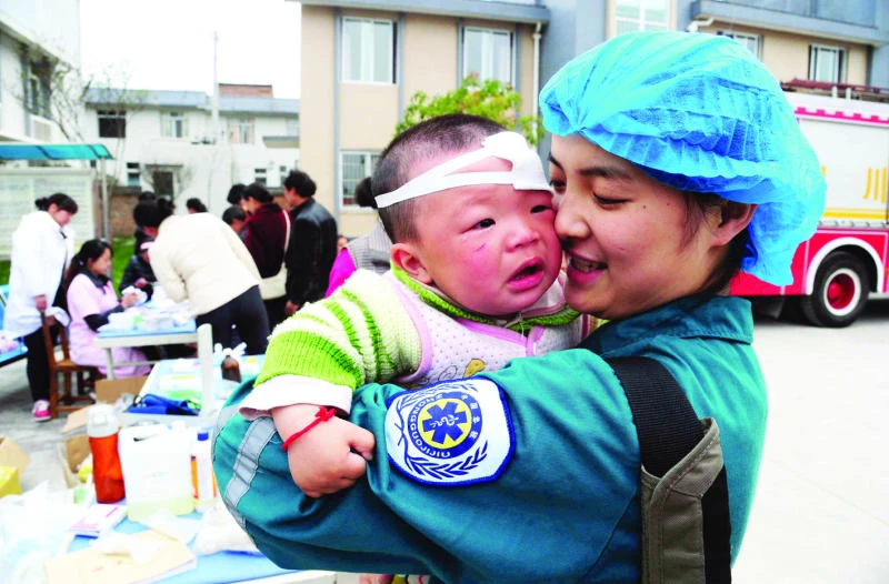 Rescuers in China scramble to find quake survivors