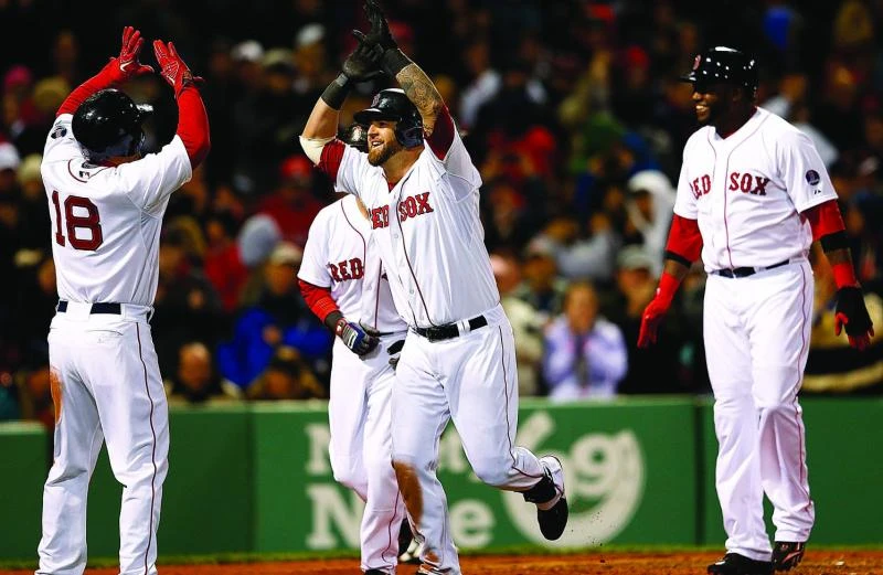 Napoli slam powers Red Sox past Athletics