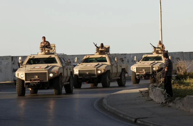 Libya arrests 20 after attack on police compound