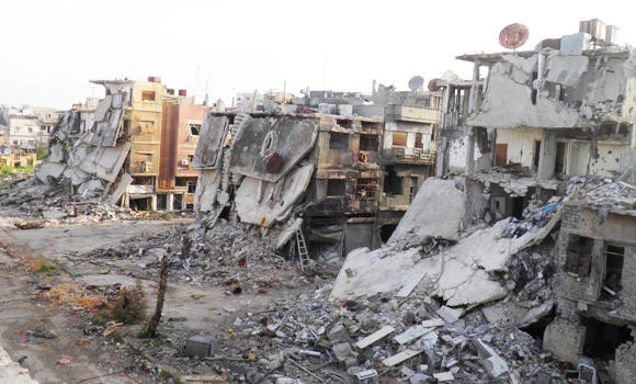 Syrian fighters capture parts of army base in Homs
