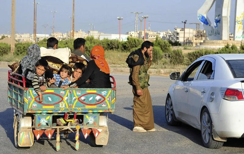 Jordan arrests eight Syrians over camp violence