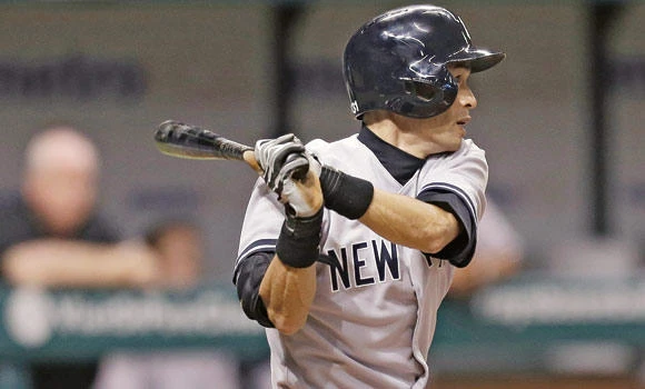 Suzuki hits 2-run single in 9th as Yankees clip Rays