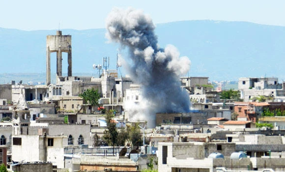 Scud fired on Syria town kills 4 civilians