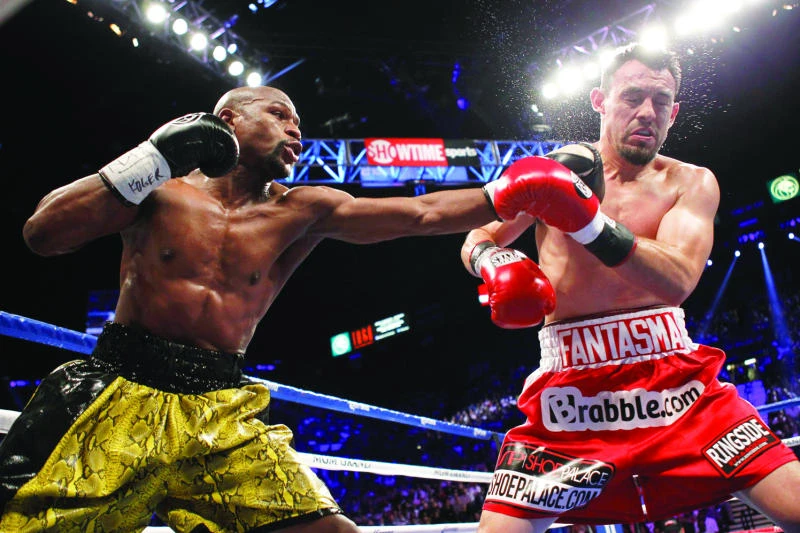 Mayweather hammers Guerrero for easy win
