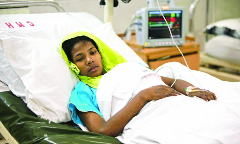 Finding woman alive lifts Bangladesh rescuers, toll soars to over 1,100